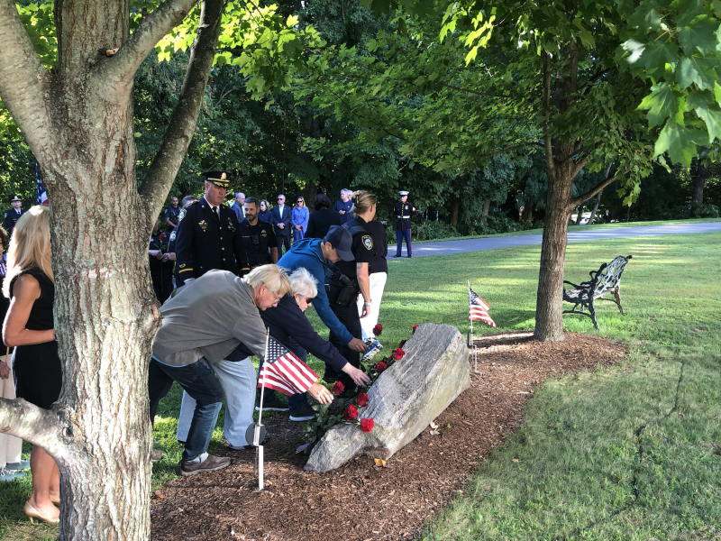 Sept 11 Memorial 9/11 roses and flags placed